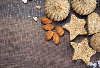Homemade healthy and sweet groundnut or peanut and Jaggery Laddoo, delicious indian sweet served on a wooden background.Roasted peanut isolated.