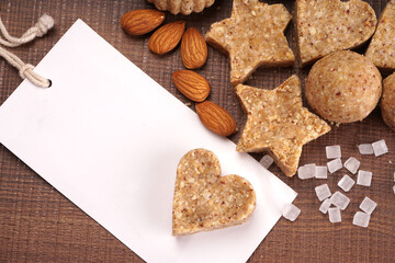 Homemade healthy and sweet groundnut or peanut and Jaggery Laddoo, delicious indian sweet served on a wooden background.Roasted peanut isolated.