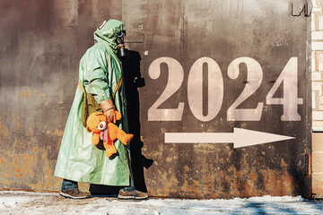 Man in radiation protective suit and gas mask carrying toy bear against 2024 text and white arrow...
