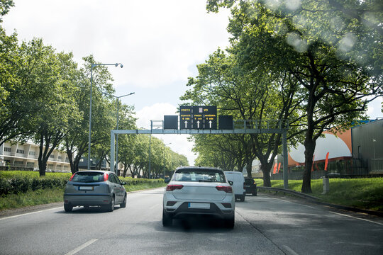 Image of section of AEP avenue, Matosinhos - Porto, Portugal. Local transit during the day. Information boards.