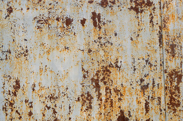 metal with rust, cracked paint on metal coating