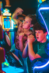 kids playing in an arcade