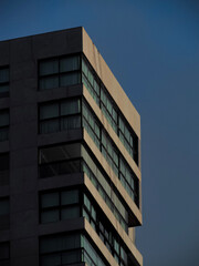 Tall building exterior at sunrise