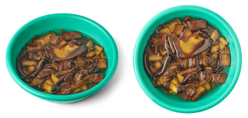cut banana peels pieces soaked in a cup of water, food waste used as natural fertilizer, kitchen waste management concept, cheap and eco friendly organic compost, isolated 