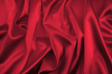 Red satin, silk, texture background.