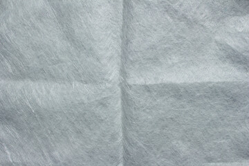 Grey grunge fabric texture or background