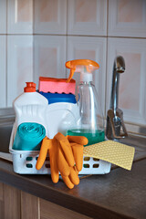 Kitchen care kit: protective gloves, detergent, napkin, garbage bags. Close-up