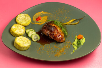front view fried meat slice with cooked squashes inside plate on pink background meat food meal vegetable color