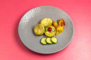 half-top view cooked squash slices with potatoes and cucumber inside plate on pink background food vegetable dinner color