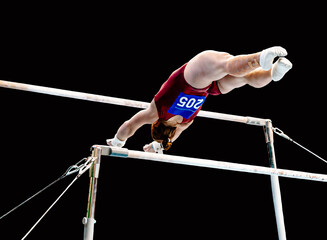 female gymnast exercise on uneven bars in gymnastics, black background, sports summer games