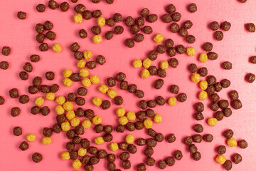 top view chocolate ball flakes tasty meal for breakfast spread all over pink background breakfast flakes food meal kids composition