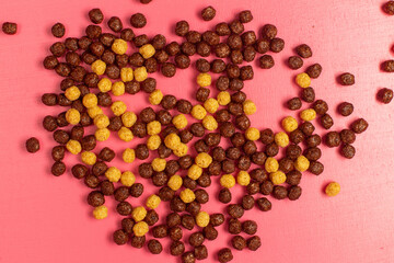 top view chocolate ball flakes tasty meal for breakfast spread all over pink floor breakfast flakes food meal kids