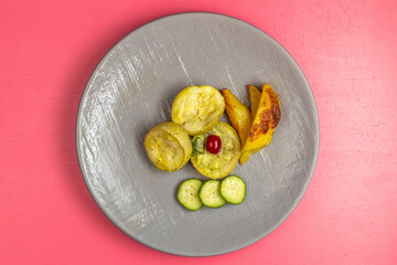 top view cooked squash slices with potatoes and cucumber inside plate on pink desk food vegetable dinner color meal