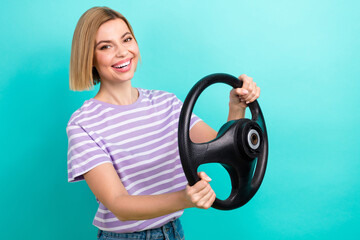 Photo of young lady wear striped t-shirt hold steering wheel fast speed kia sorento insurance company isolated on cyan color background