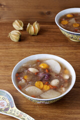 Snow Fungus soup with fruits and almonds. Sweet soup from Chinese cuisine.