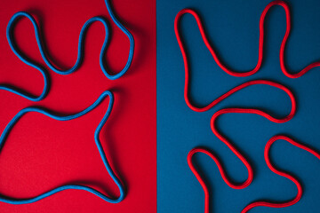 Colored vivid shoelaces on colorful backdrop