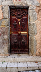 Old door in Entrevaux village, France