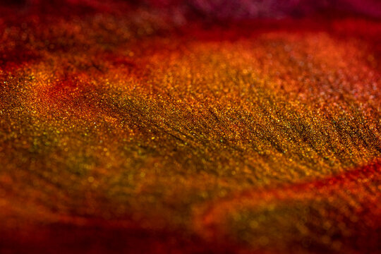 Shiny particles of metallic paint