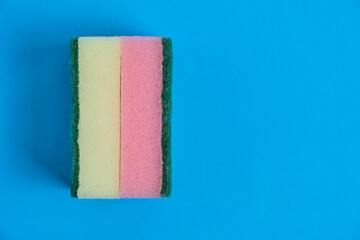 Two foam sponges for washing dishes.