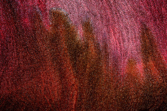 Shiny particles of metallic paint