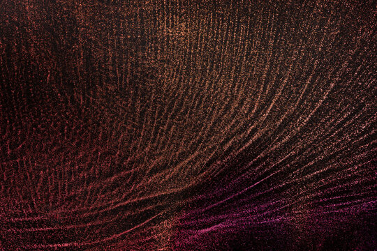 Shiny particles of metallic paint