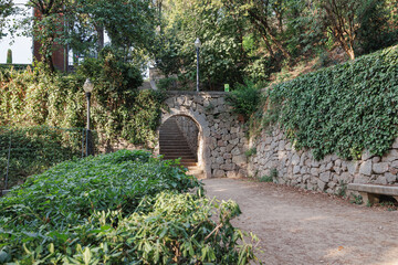 Fototapeta na wymiar Masonry Archway and Staircase inside Montjuic Garden Public Park, Barcelona, Spain