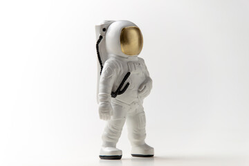 front view of white astronaut on white desk fantasy sci fi cosmic