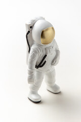 front view of white astronaut on white surface sci fi fantasy