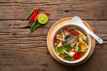 Tom Yam canned mackerel fish in tomato sauce with Shimeji mushroom.Asian spicy soup.Top view
