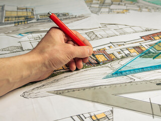 Architectural design. Drawing in progress. Drawing on the table. Architectural sketching. Handmade....