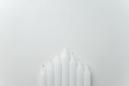 top view white candles on the white background funeral fire lamp death flame