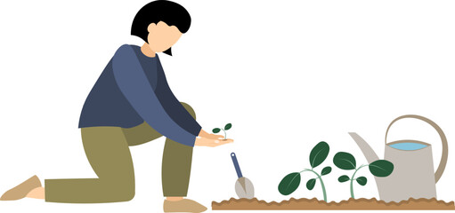 Planting and gardening. A woman is planting plants in the garden.