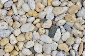 Close-up round and oval multicolored river stones
