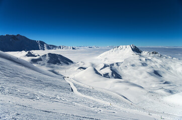 winter high mountain landscape, ski resort, French Alps - 594742755