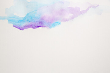 Close up shot of purple and blue waves on the right side on white isolated background