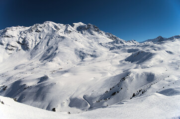 winter high mountain landscape, ski resort, French Alps - 594743736