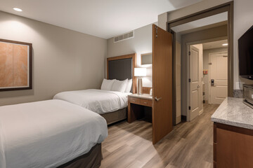 Fototapeta na wymiar luxury hotel room. a guest room in an apartment. Bedroom with two beds. Double room. generative ai