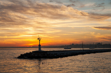 The sunset view on the historical peninsula behind the haydarpaşa breakwater