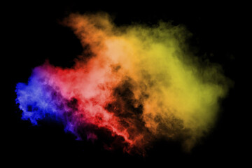 Abstract colored dust explosion on a black background.abstract powder splatted background,Freeze motion of color powder exploding throwing color powder, multicolored glitter texture.