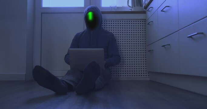 Unrecognizable hacker work at computer sitting on floor. Binary green glowing code hides the face, abstraction. Concept of digital security, work, successfully completed task, programming.