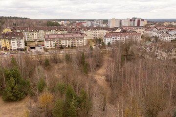 Drone photography of residential area surrounded by forest