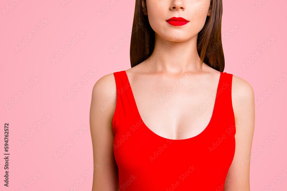 Sticker Close up half face portrait of confident brunette woman with red lips in vivid swimsuit isolated on bright yellow background