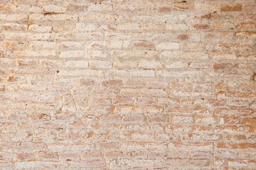 Old vintage dirty brick wall with white stains background