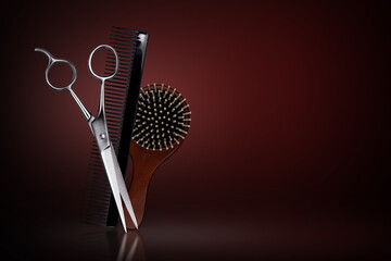 Scissors, combs, comb on a red background. Tools of a hairdresser, barber