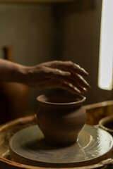 a potter creates handmade handicrafts