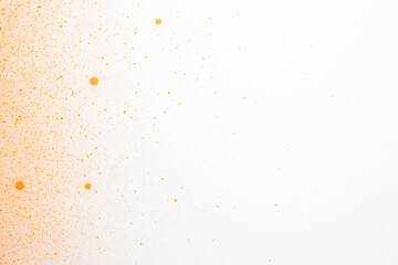 Fototapeta na wymiar above view orange paint on white surface painting horizontal exhibition artist color photo dust