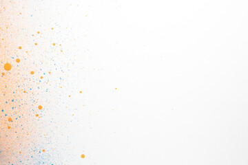 Fototapeta na wymiar above view orange paint on white surface painting photo art horizontal exhibition color dust artist