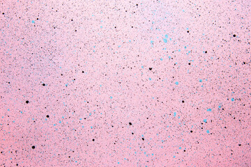 above view pink surface with black paints color artist painting art horizontal photo dust