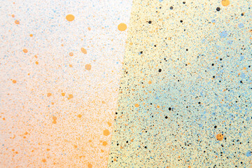 above view white surface with blue and orange paints color artist painting dust art horizontal photo
