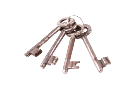 A simple set of 4 old worn metal keys on one keychain, object isolated on white, cut out, nobody. Prison jail cell keys key chain, safety, security measures, keys in technology abstract concept